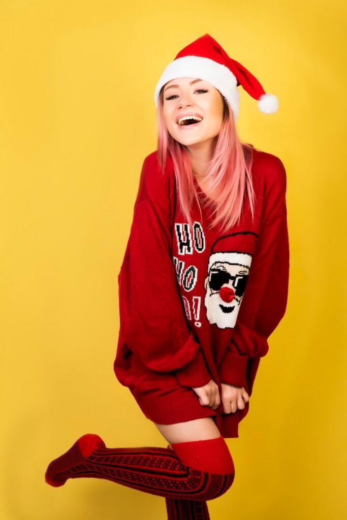 Oversized Red Santa Graphic Sweater + Red Thigh-High Socks + Santa Hat