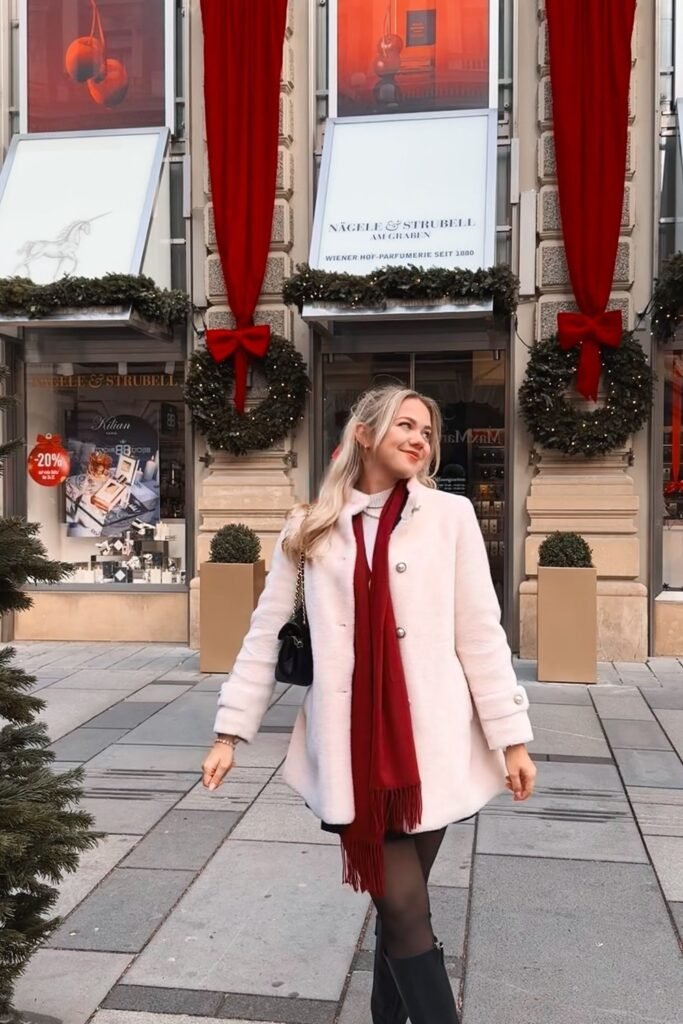 Pale Pink Faux Fur Coat + Red Fringe Scarf + Black Tights and Boots