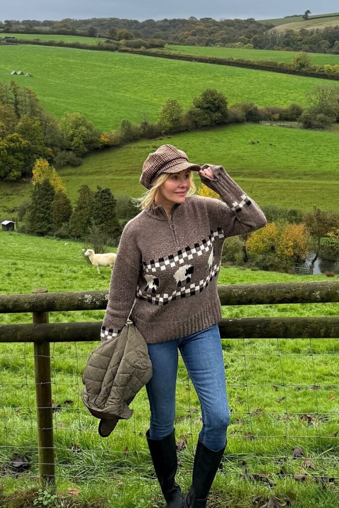 Patterned Knit Quarter-Zip Sweater + Blue Skinny Jeans + Black Knee-High Rain Boots