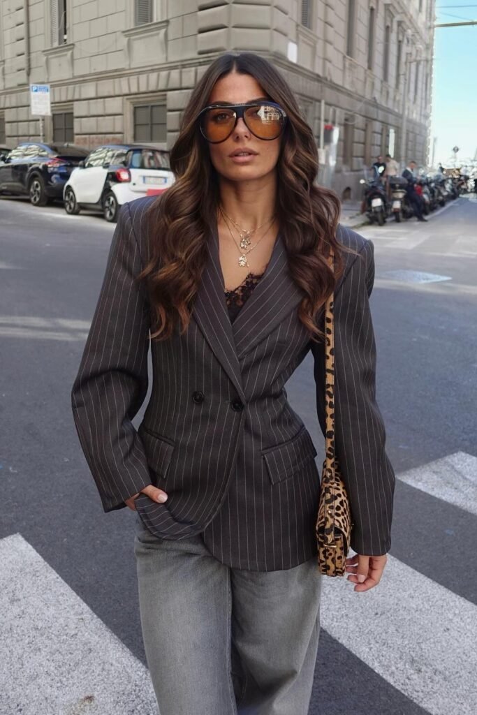 Pinstripe Double-Breasted Blazer + Black Lace Camisole + Grey Wide-Leg Jeans + Leopard Print Bag