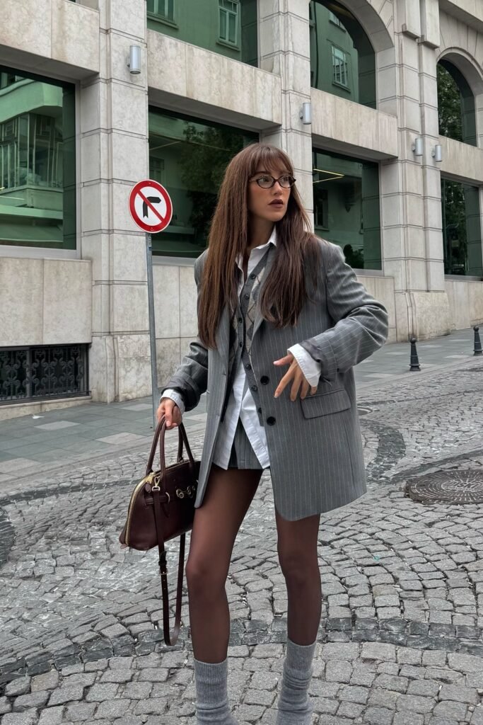 Pinstripe Oversized Blazer + Argyle Sweater Vest + White Button-Down Shirt + Grey Slouch Socks