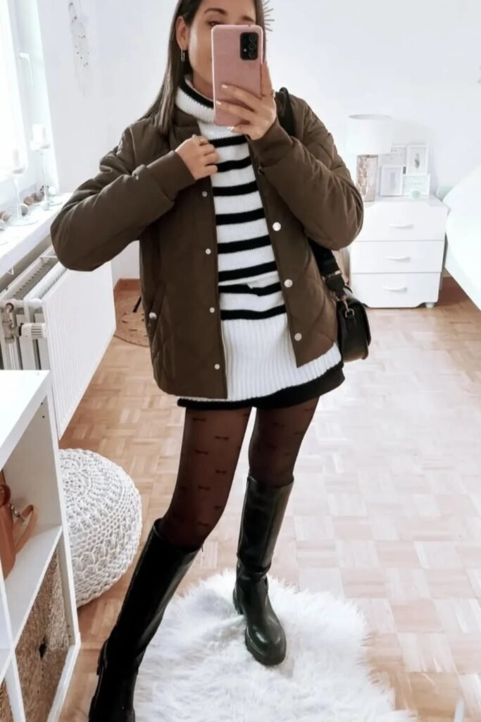 Quilted Olive Green Jacket + Striped White and Black Sweater + Black Mini Skirt + Patterned Black Tights + Black Knee-High Boots