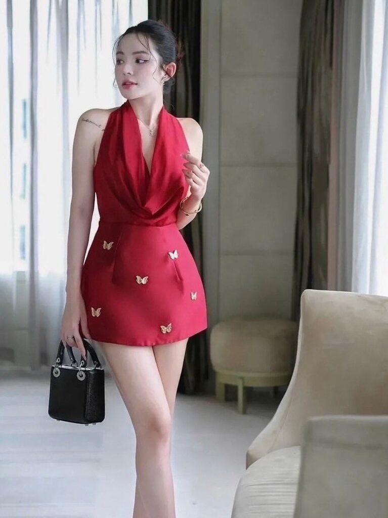 Red Halter Mini Dress with Butterfly Appliques + Black Top-Handle Bag