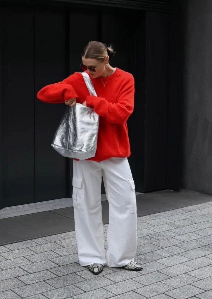 Red Oversized Sweater + White Wide-Leg Cargo Pants + Silver Tote Bag + Snake-Print Flats