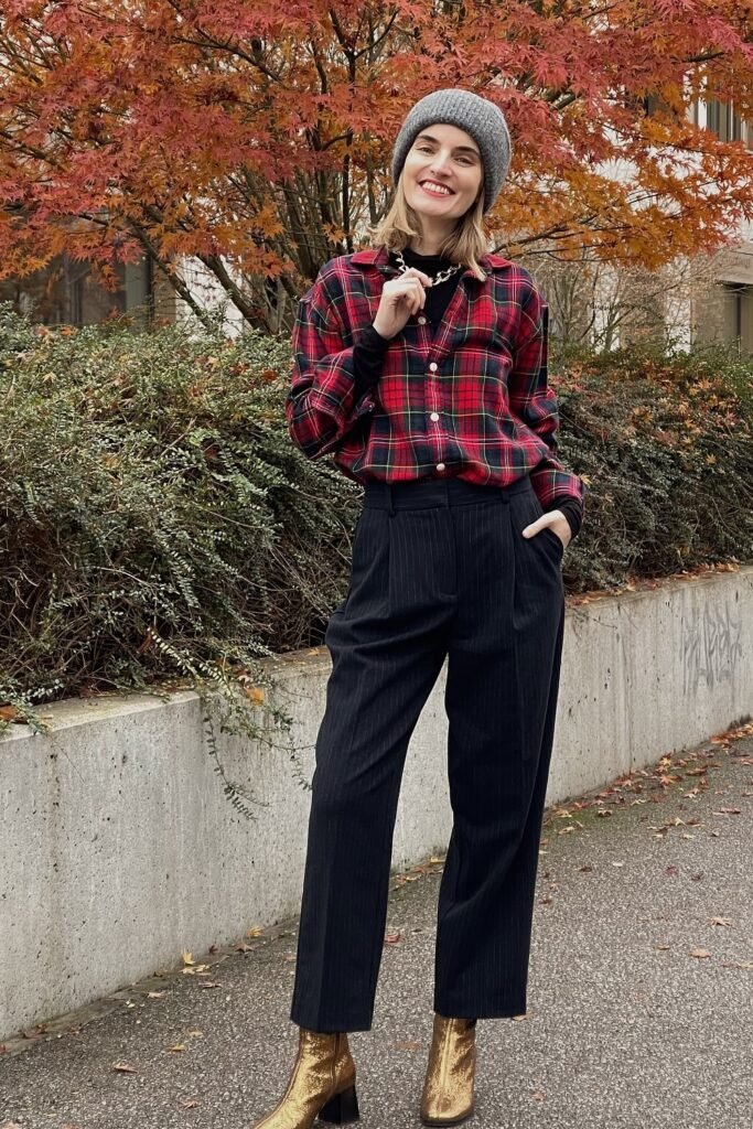 Red Plaid Button-Down Shirt + Black Pinstripe Trousers + Gold Ankle Boots + Grey Beanie