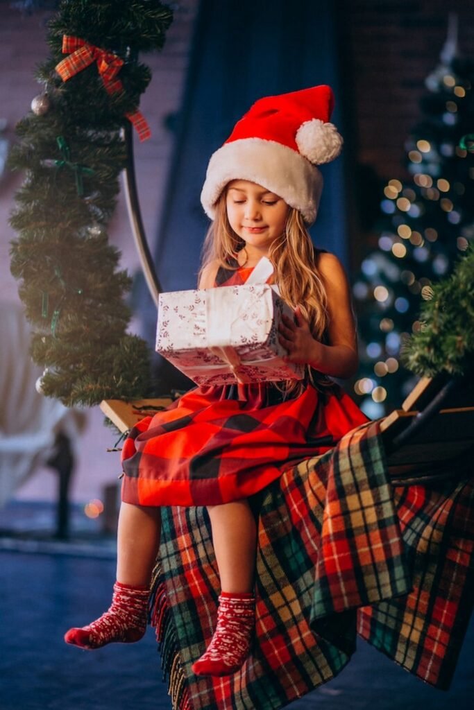 Red Plaid Dress + Red Patterned Socks + Santa Hat + Plaid Blanket