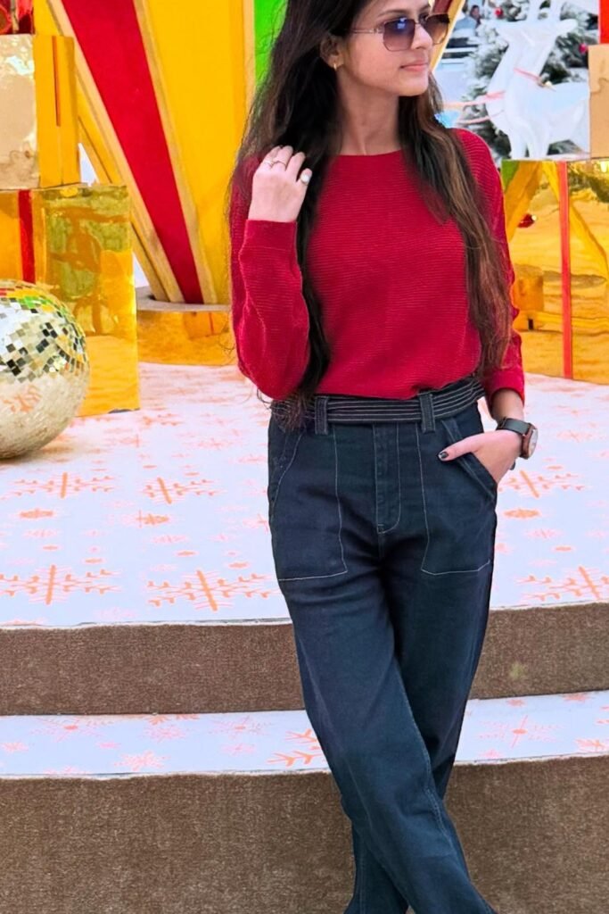 Red Ribbed Sweater + Dark Wash High-Waisted Trousers + Sunglasses