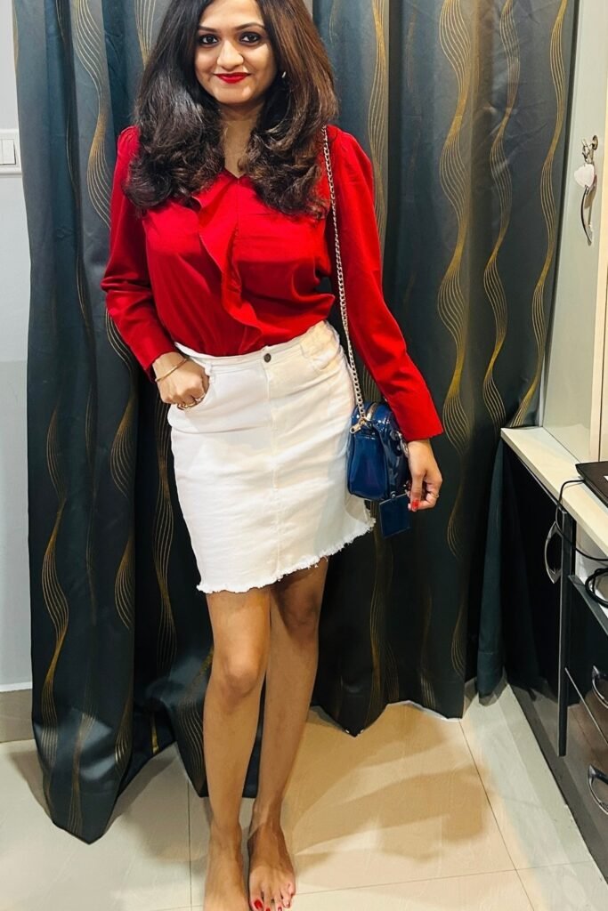 Red Ruffled Blouse + White Frayed Denim Skirt + Navy Chain Bag