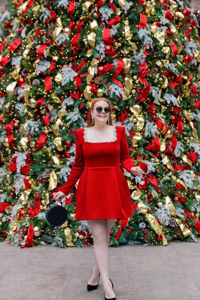 Red Velvet Mini Dress with Square Rhinestone Neckline + Black Pumps + Black Round Handbag