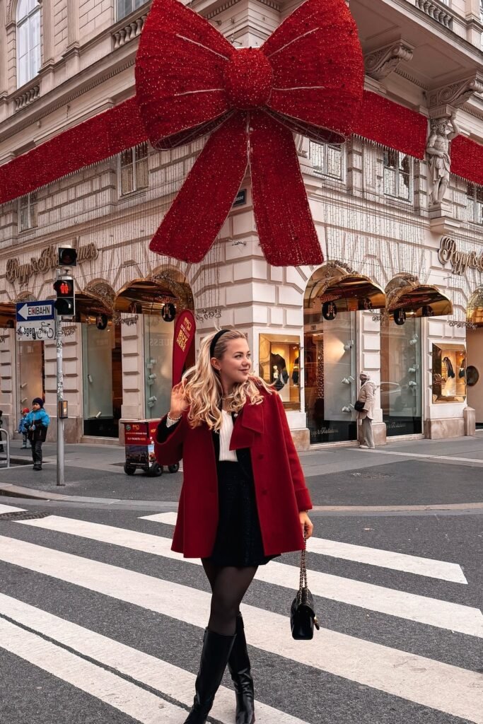 Red Wool Coat + Black Mini Dress + Black Knee-High Boots