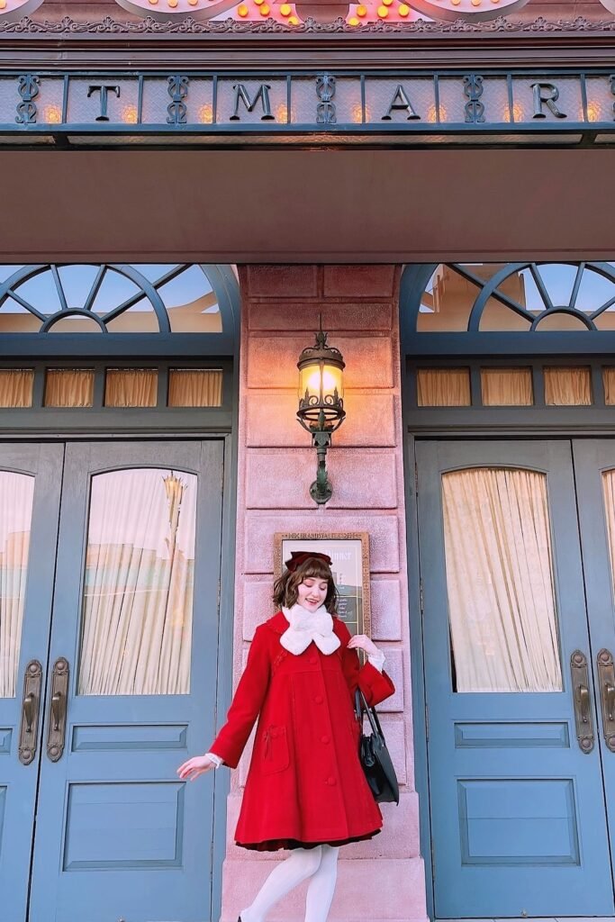 Red Wool Coat + White Ruffled Scarf/Collar + White Tights + Black Handbag