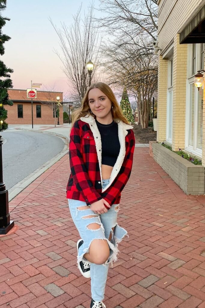 Red and Black Plaid Sherpa Jacket + Black Crop Top + Light Wash Ripped Jeans + Black and White Sneakers
