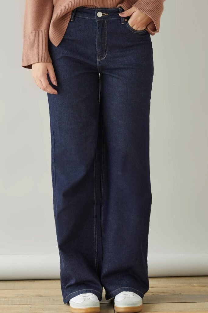 Rose Gold Knit Sweater + Dark Wash Wide Leg Jeans + White and Beige Sneakers