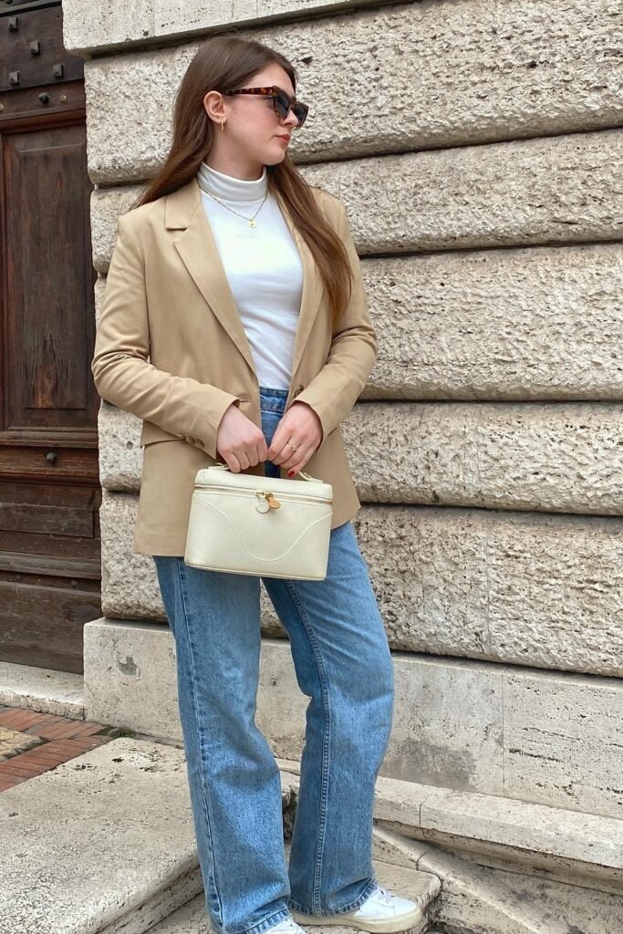 Tan Blazer + White Turtleneck Top + Light Wash Wide-Leg Jeans + White Sneakers