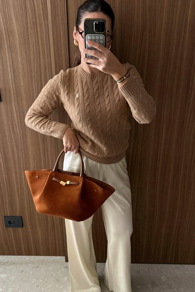 Tan Cable Knit Sweater + Cream Wide-Leg Satin Trousers + Brown Suede Tote Bag