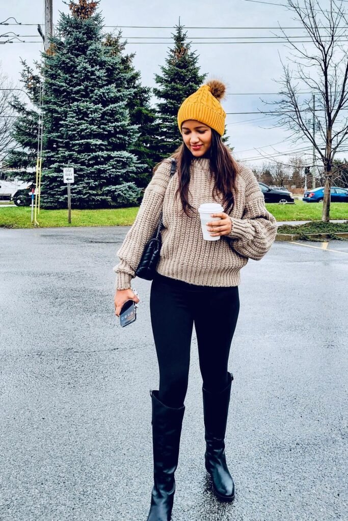Tan Chunky Knit Sweater + Yellow Pom-Pom Beanie + Black Leggings