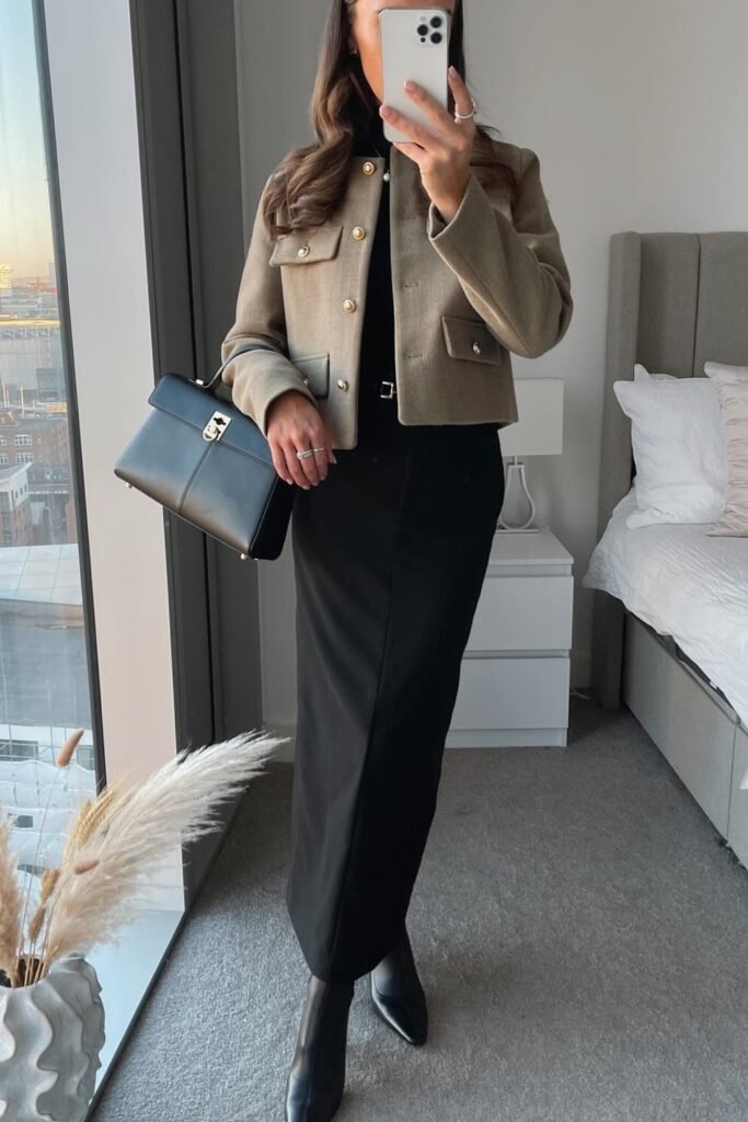 Tan Cropped Military-Style Jacket + Black Turtleneck Top + Black Maxi Skirt + Black Ankle Boots