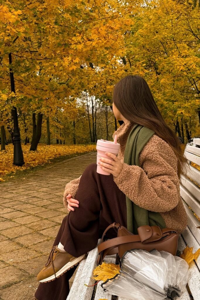 Tan Teddy Fleece Jacket + Dark Brown Wide-Leg Trousers + Olive Green Scarf + Brown and Tan Sneakers