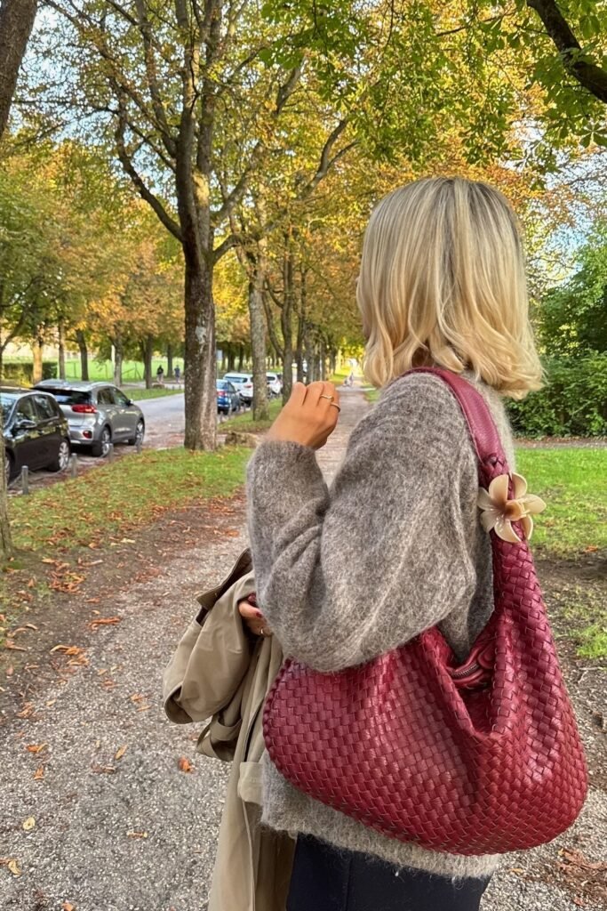 Taupe Fluffy Knit Sweater + Black Trousers + Burgundy Woven Hobo Bag + Tan Trench Coat