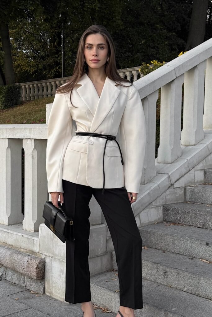 White Belted Blazer + Black Tailored Trousers + Black Heels + Black Structured Handbag