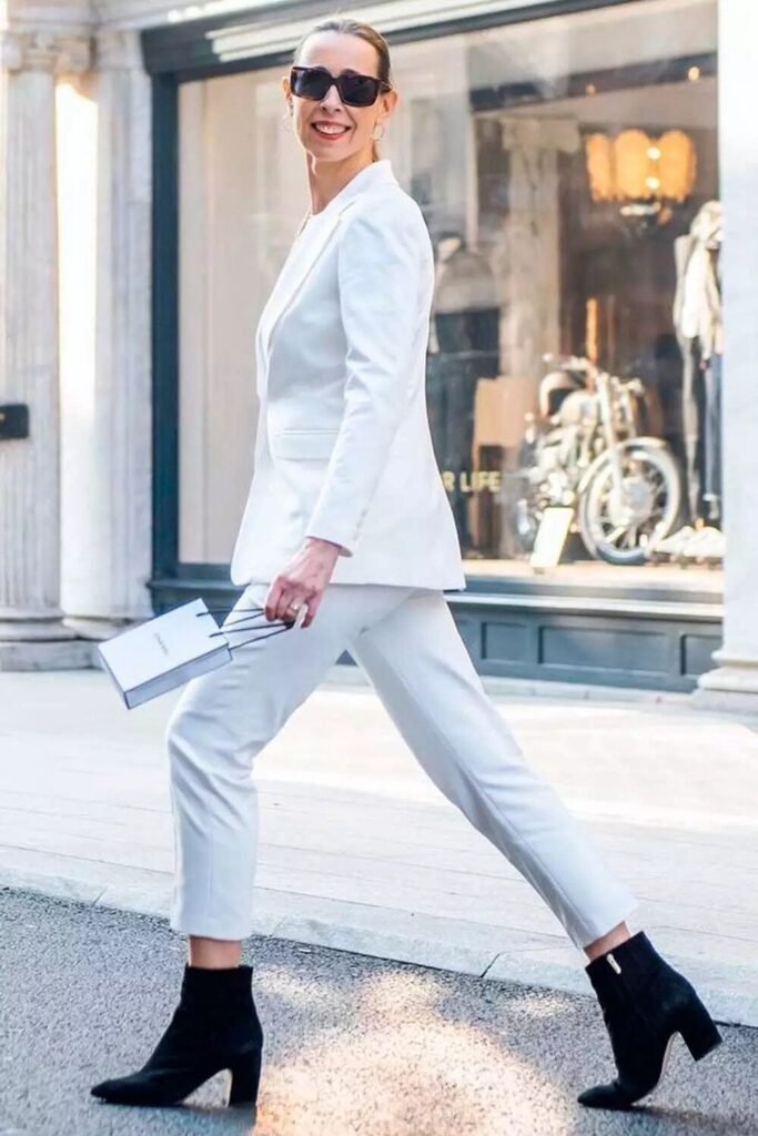 White Blazer Suit + White Trousers + Black Ankle Boots + Black Sunglasses