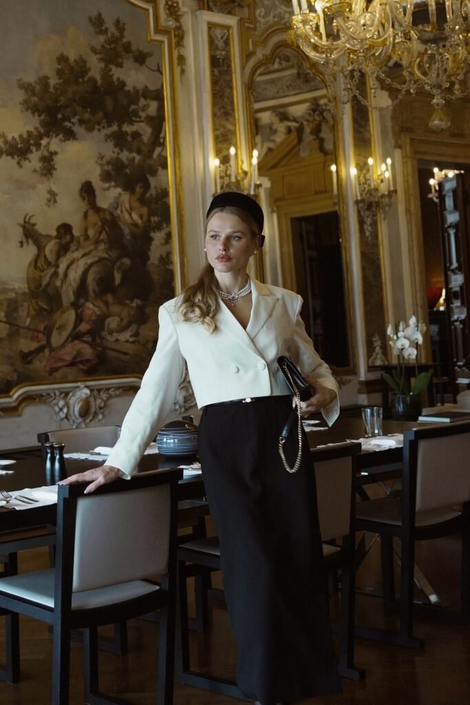 White Cropped Blazer + Black Maxi Skirt + Black Headband + Pearl Necklace + Black Chain Clutch