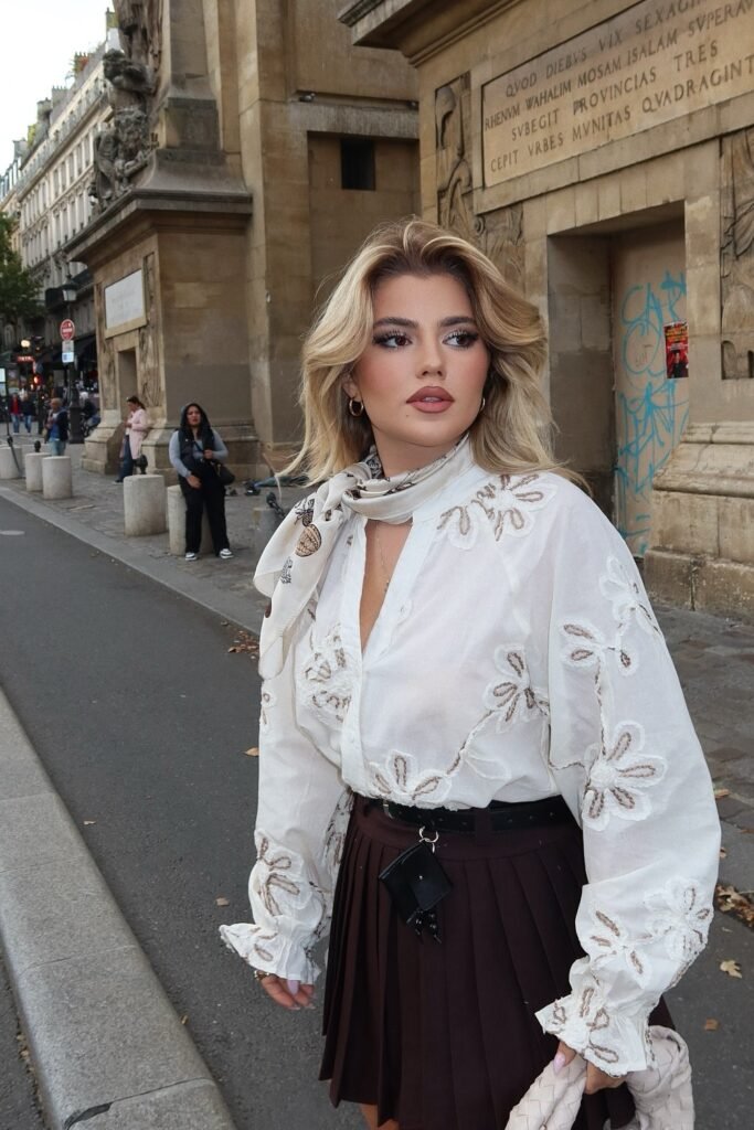 White Embroidered Blouse with Scarf Neck + Brown Pleated Mini Skirt + Thin Black Belt