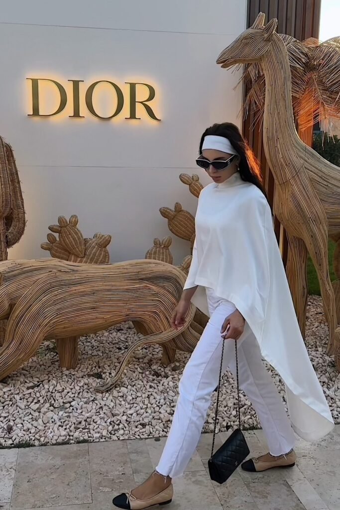 White High-Neck Asymmetric Poncho Top + White Cropped Jeans + Two-Tone Cap-Toe Flats