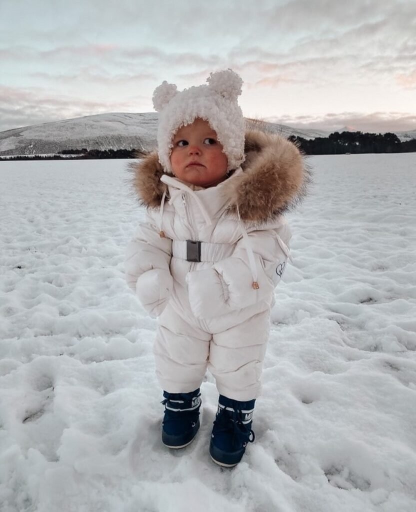 White Puffer Snowsuit + White Bear Beanie + Navy Snow Boots