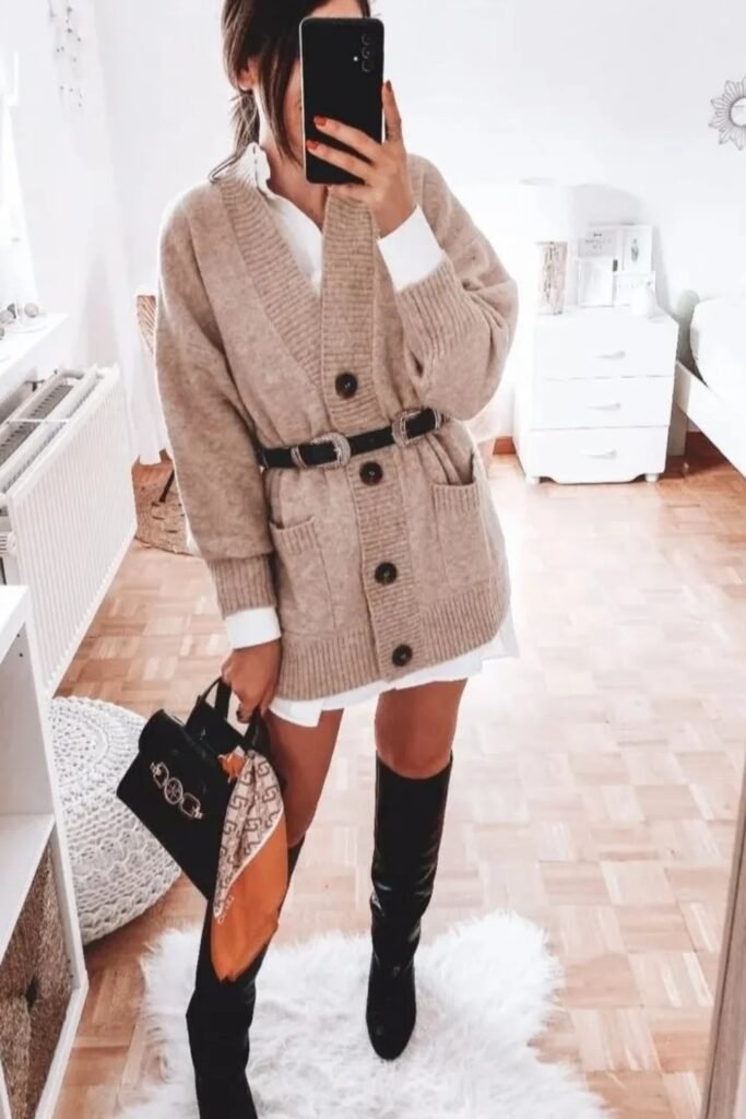 White Shirt Dress + Beige Cardigan with Belt + Black Knee-High Boots + Black Handbag with Scarf