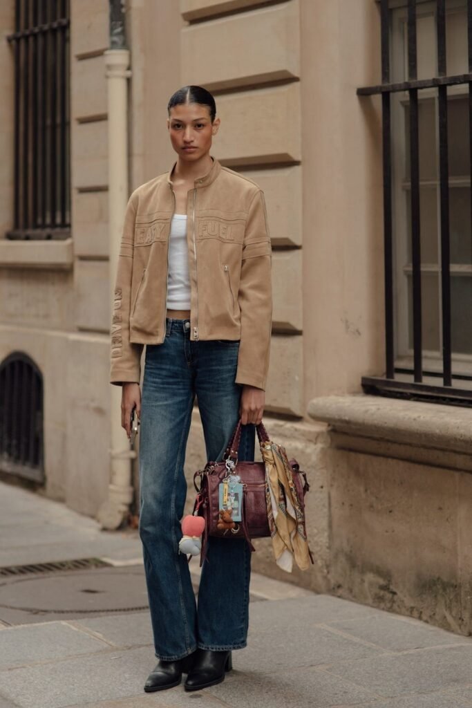 White Tank Top + Tan Suede Cropped Bomber Jacket + Blue Flared Jeans + Black Ankle Boots + Burgundy Handbag with Scarf