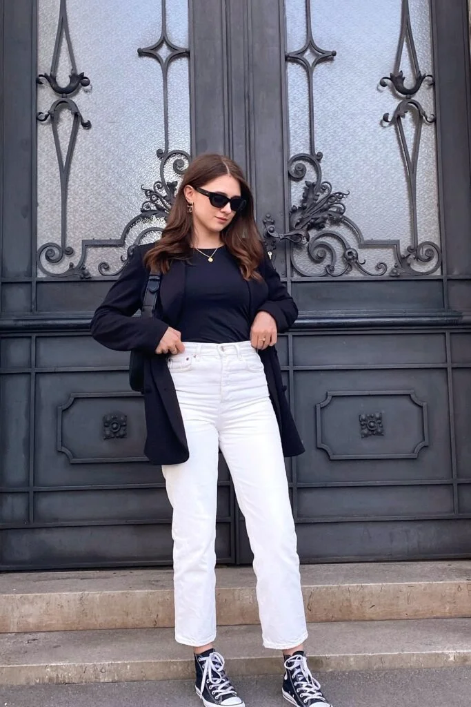 Black Blazer + Black Top + White Straight-Leg Jeans + Black High-Top Converse Sneakers
