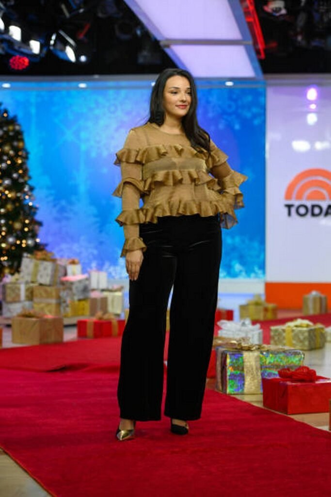 Ruffled Gold-Toned Blouse and Black Velvet Wide-Leg Pants