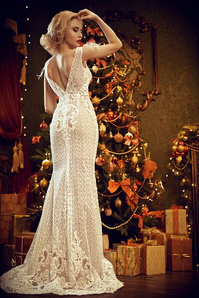 White Lace Plunging Back Gown and Christmas Tree