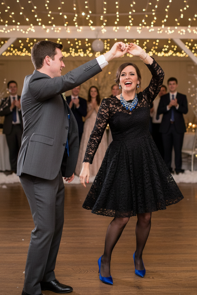 Black lace dress with royal blue satin heels at a winter wedding reception.