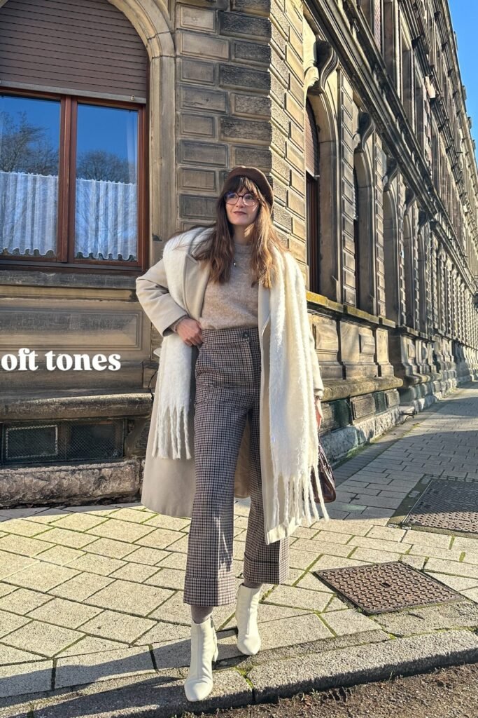 Beige Crewneck Sweater + Brown Gingham Flared Trousers + Tan Overcoat + White Ankle Boots