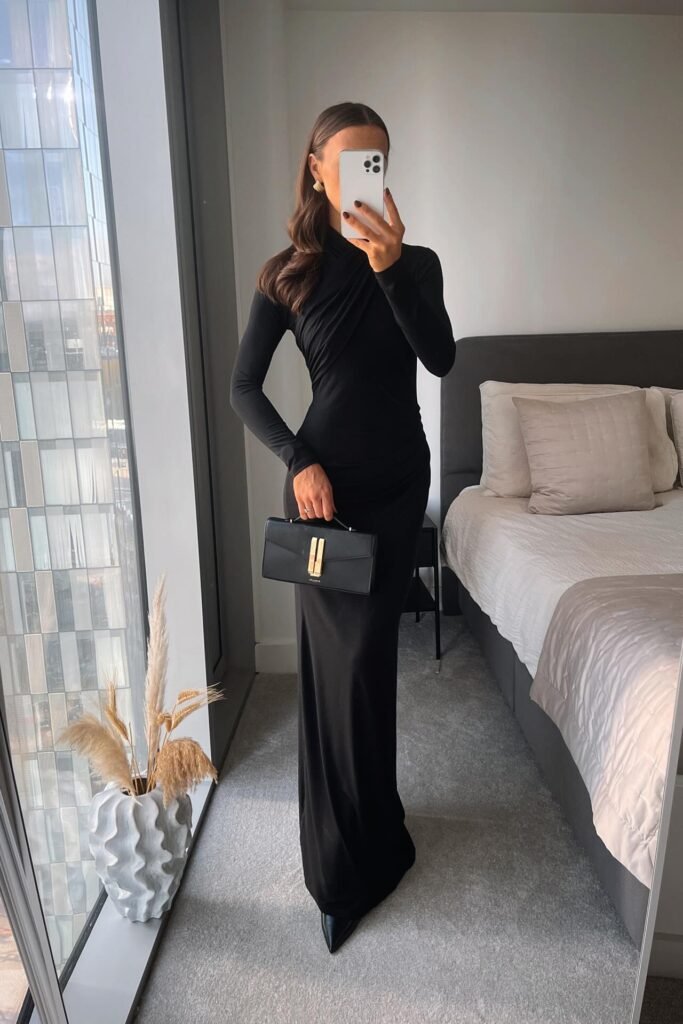 Black Draped Long-Sleeve Maxi Dress + Black Pointed Heels + Black Structured Clutch