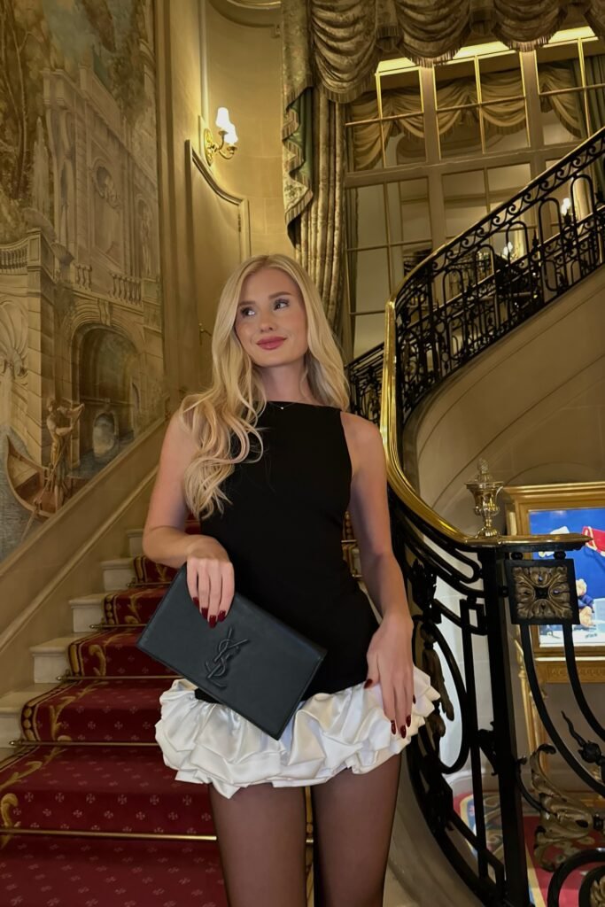 Black Sleeveless Top + White Voluminous Ruffled Mini Skirt + Black YSL Clutch + Black Sheer Tights