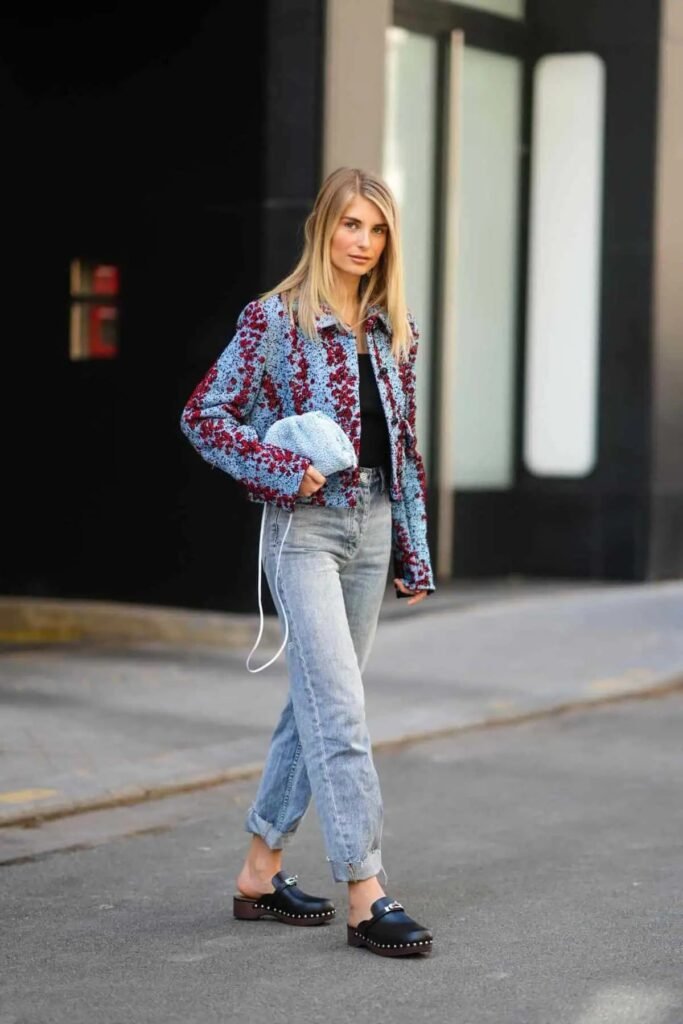 Blue and Red Patterned Jacket + Black Top + Straight Leg Jeans + Black Clogs