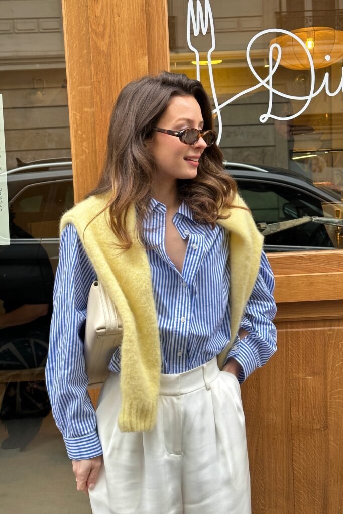 Blue and White Striped Button-Down + Butter Yellow Sweater (draped) + White High-Waisted Trousers
