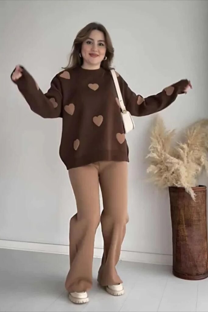 Brown Heart Print Sweater + Tan Flared Trousers + Beige Platform Loafers