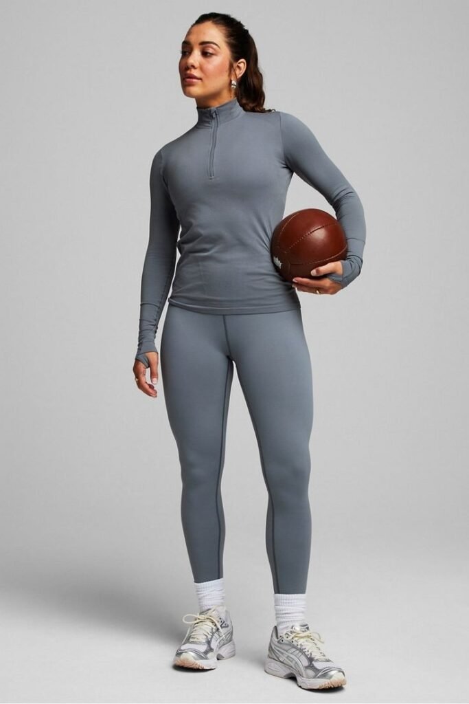 Grey Quarter-Zip Performance Top + Grey Leggings + White Athletic Sneakers