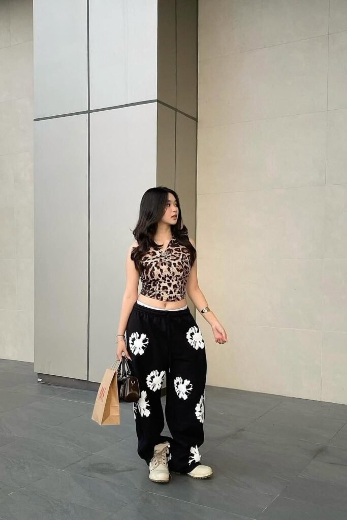Leopard Print Halter Top + Black Floral Graphic Wide Leg Sweatpants + White Boots