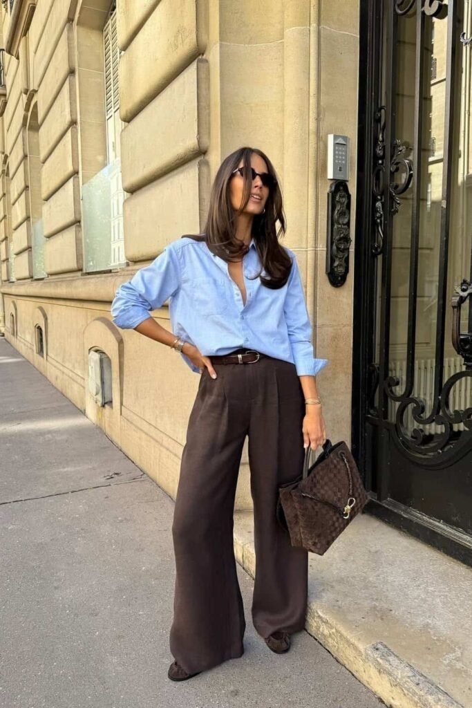 Light Blue Button-Down Shirt + Chocolate Brown Wide-Leg Trousers + Dark Brown Suede Tote