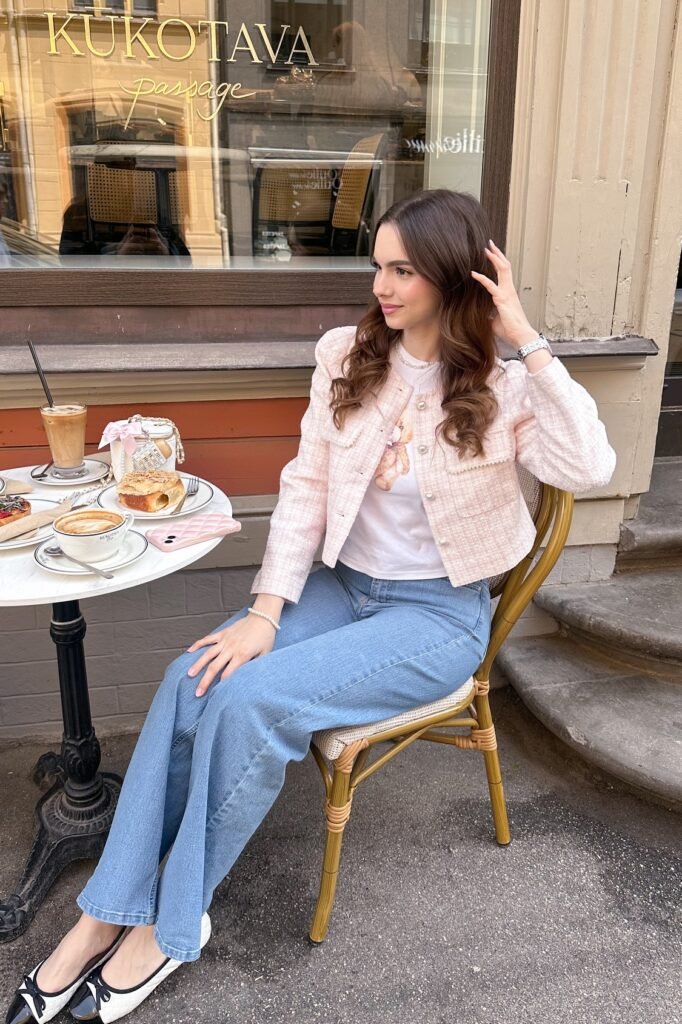Light Pink Tweed Jacket + Graphic White T-Shirt + Light Wash Wide-Leg Jeans + Black-Toe Ballet Flats
