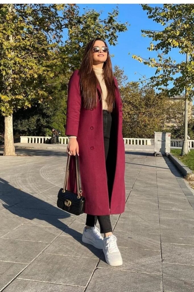 Long Burgundy Wool Coat + Cream Turtleneck + Black Skinny Jeans + White Platform Sneakers