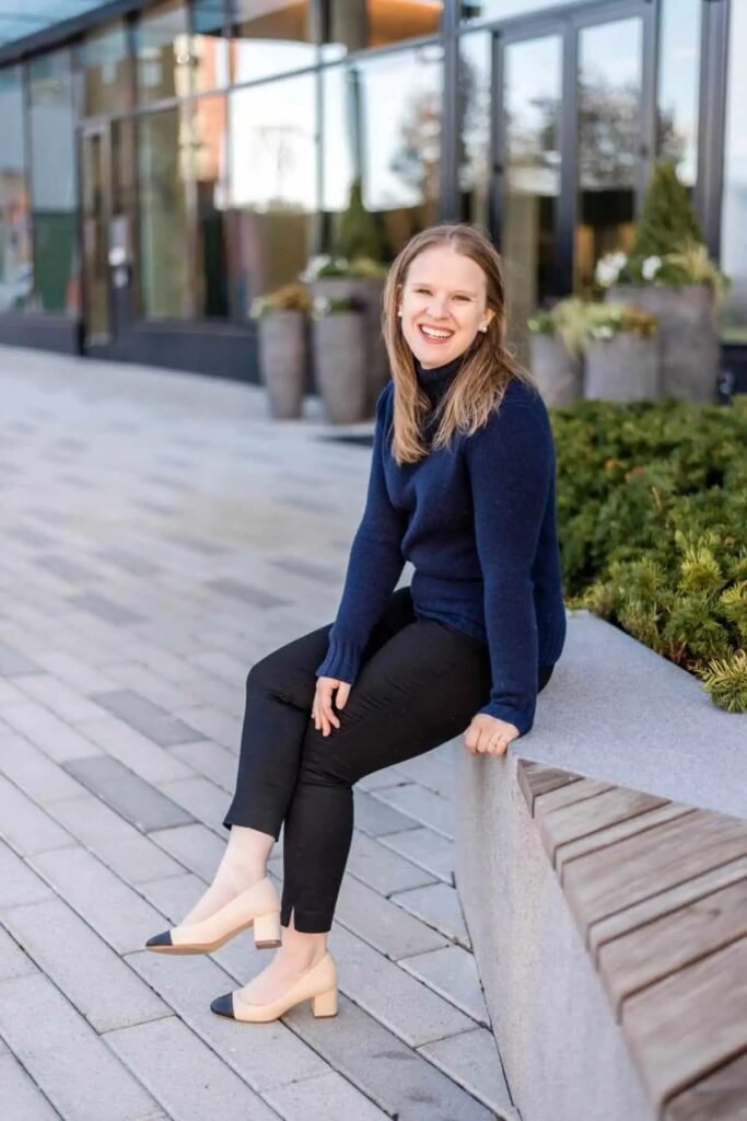 Navy Turtleneck Sweater + Black Cropped Trousers + Beige Cap-Toe Block Heels