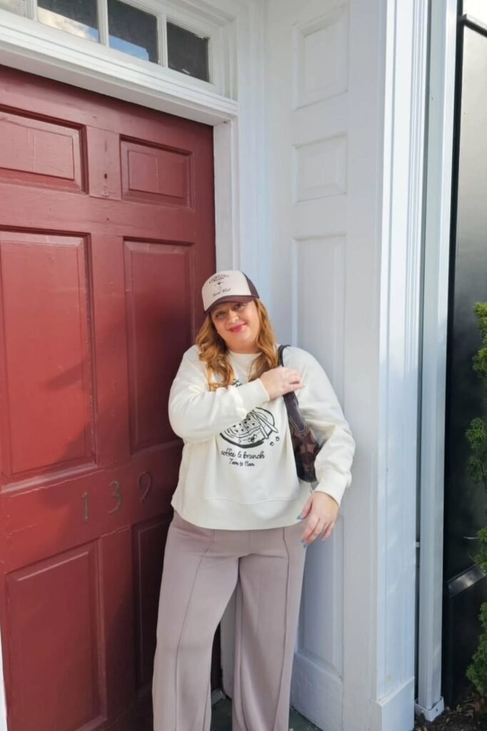 Off-White Graphic Sweatshirt + Mauve Straight-Leg Trousers + Two-Tone Trucker Hat