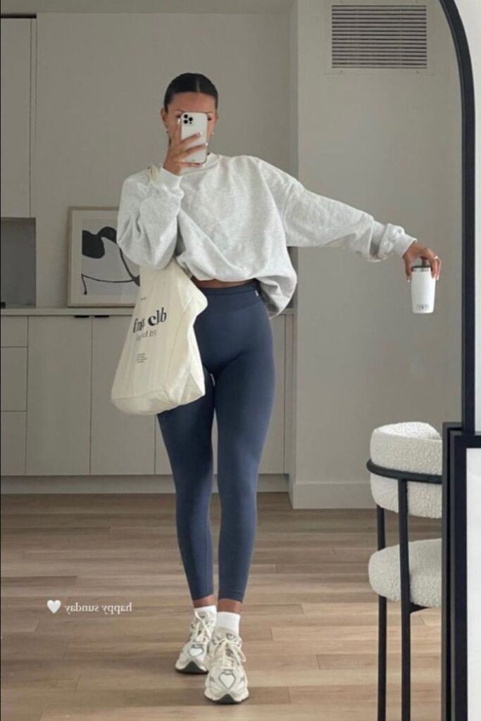 Oversized Heather Grey Sweatshirt + Slate Blue Leggings + White Crew Socks + Cream Athletic Sneakers
