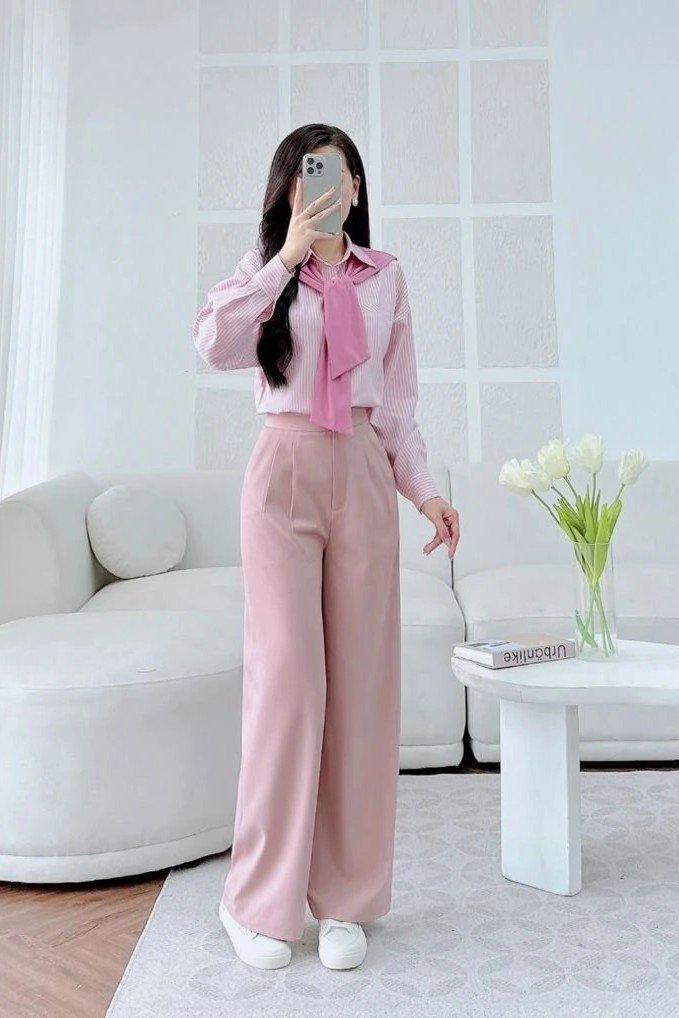 Pink Striped Button-Down + Pink Wide-Leg Trousers + Pink Sweater Over Shoulders + White Sneakers